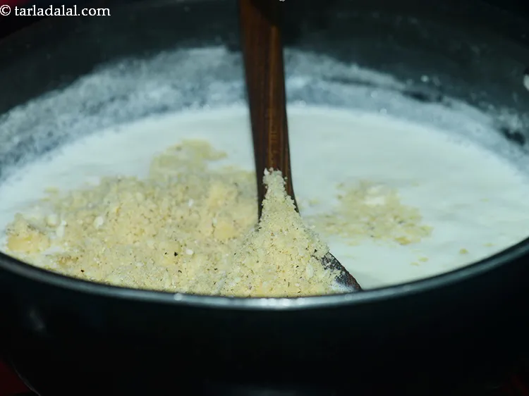 Step 9 – Add coarsely crushed lotus seeds.