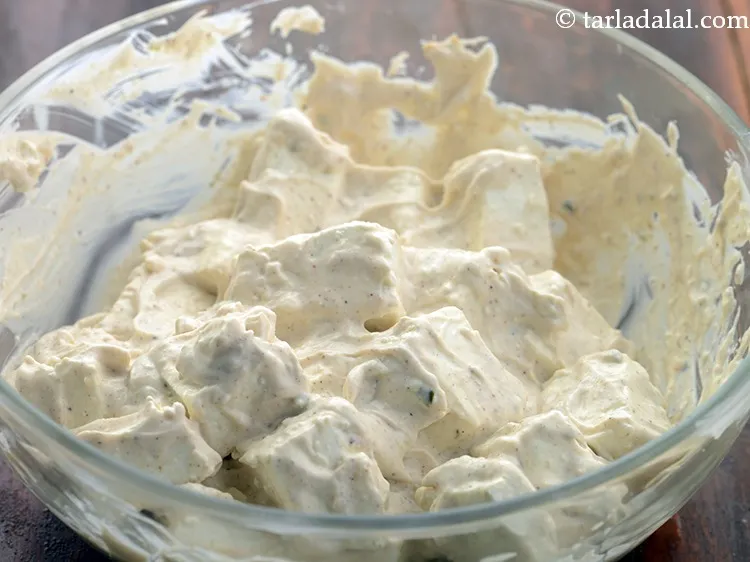 Step 12 – Toss gently till the paste coats the paneer pieces evenly from all sides.&nbsp; Ensure the …