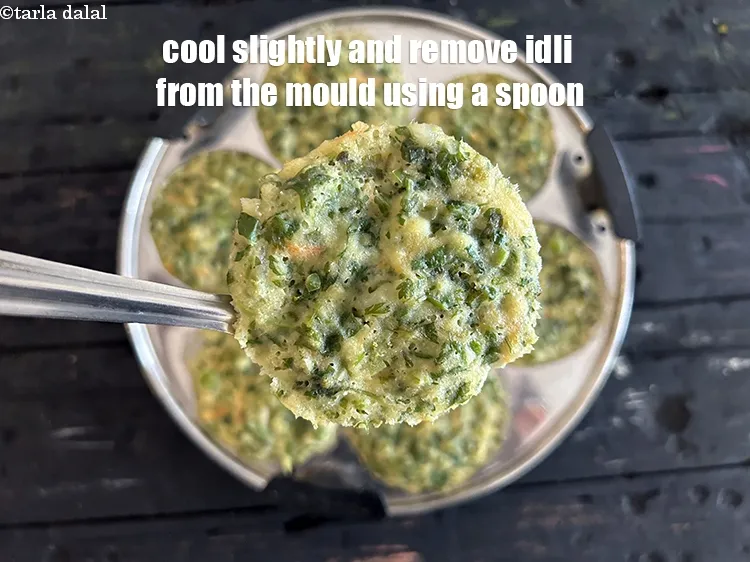 Step 39 – <meta charset="UTF-8" />Cool slightly and remove the<strong>&nbsp;Idli&nbsp;</strong>from the mould using a spoon. If you are …