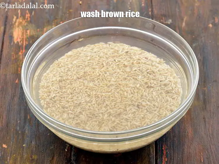 Step 3 – To make the<strong>&nbsp;Brown Rice</strong>, wash the rice thoroughly under water. This removes the impurities and …