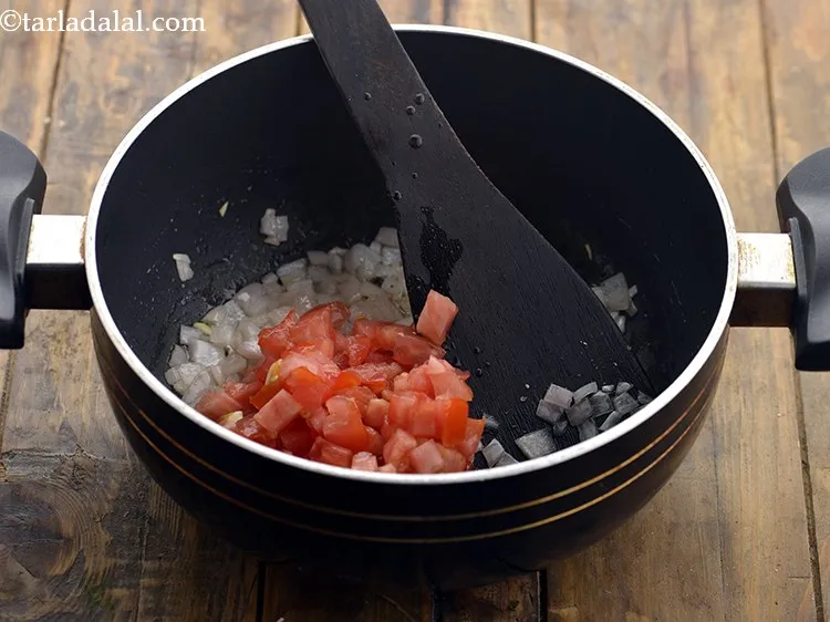 Step 13 – Add the tomatoes.