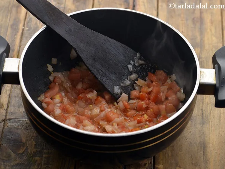 Step 14 – Mix well and cook on a medium flame for 2 minutes, while stirring occasionally.