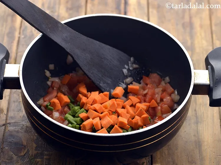 Step 16 – Next, add the carrot cubes.