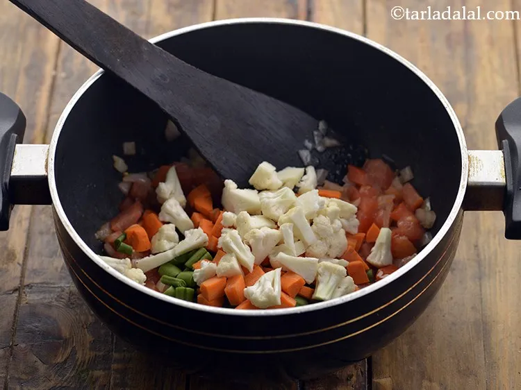 Step 17 – Add the cauliflower florets.