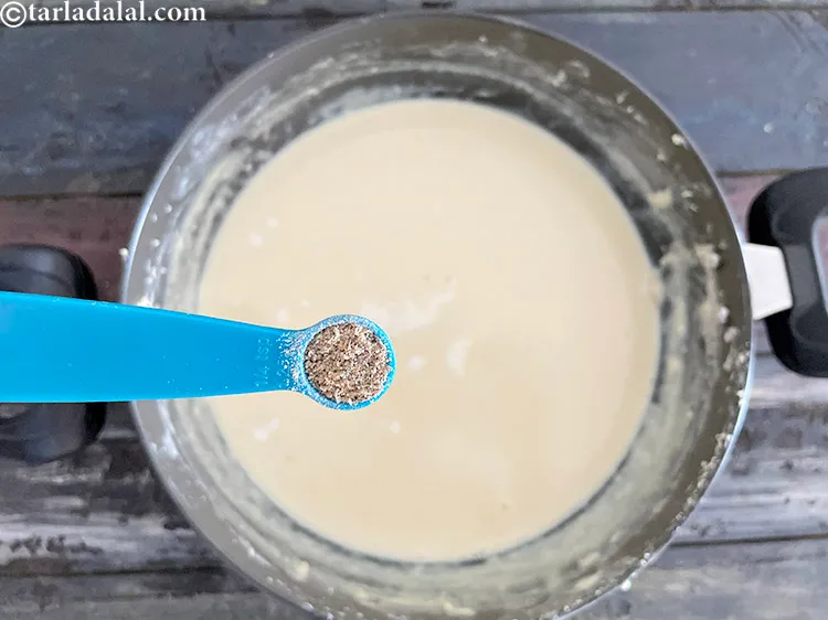 स्टेप 29 – १/४ टी-स्पून <a href=""https://www.tarladalal.com/glossary-cardamom-powder-elaichi-powder-hindi-265i"">इलायची पाउडर</a> डालें। अच्छी तरह मिलाएं।