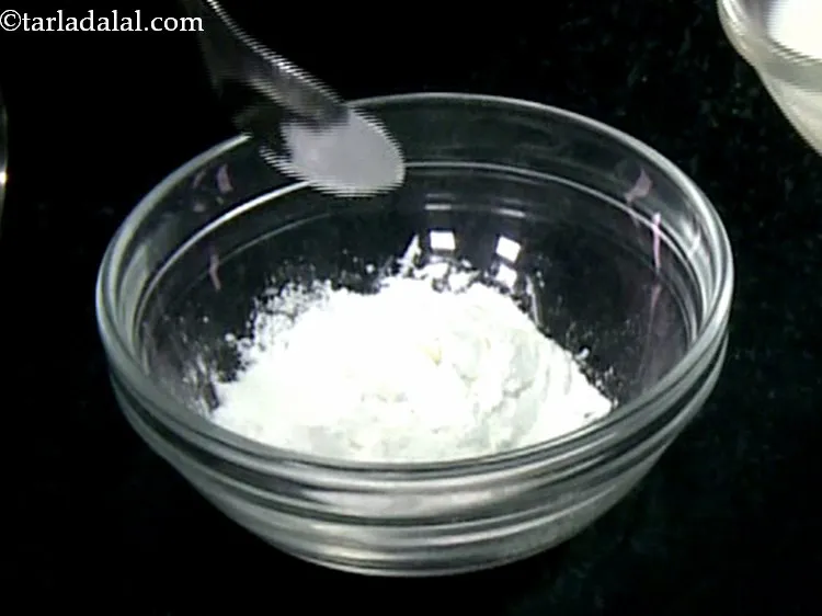 Step 9 – Simultaneously, take the corn flour in a deep bowl.