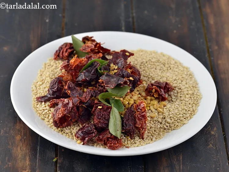 Step 11 – Remove the red chillies and curry leaves in the same flat plate.