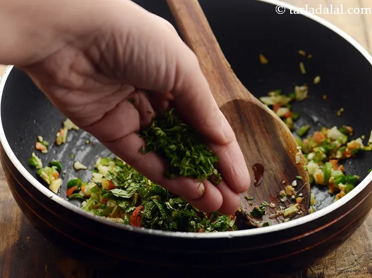 Step 27 – Add coriander.