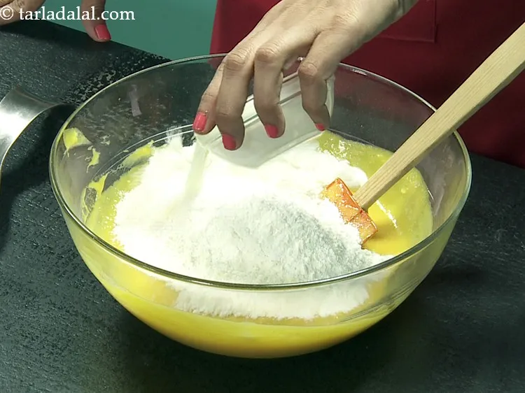 Step 22 – Add 1/4 cup&nbsp;<a href="https://www.tarladalal.com/glossary-milk-514i">milk</a>.