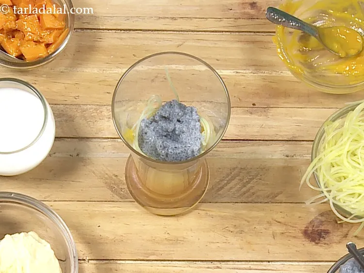 Step 13 – Add 2 tbsp <a href="https://www.tarladalal.com/glossary-soaked-falooda-seeds-1812i">soaked falooda seeds (subza)</a>.