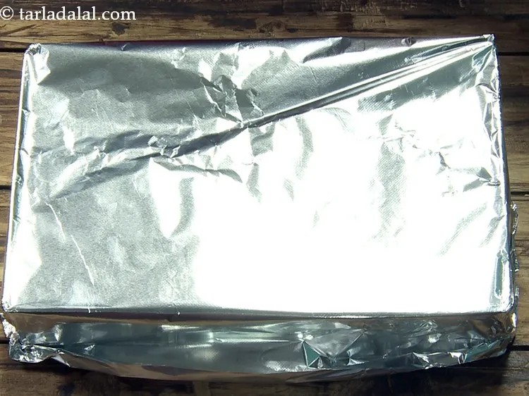 Step 23 – Cover with an aluminium foil and seal the container well.