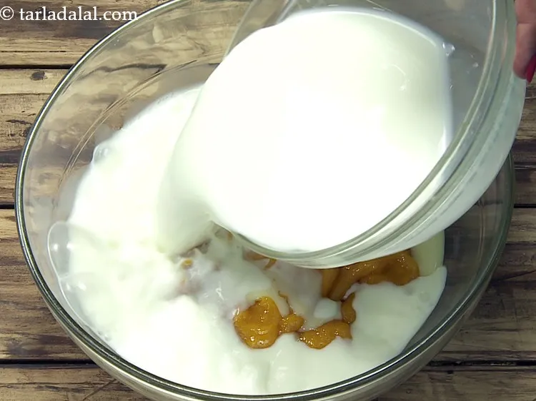 Step 19 – Add 2 cups&nbsp;<a href="https://www.tarladalal.com/glossary-milk-514i">milk</a>.