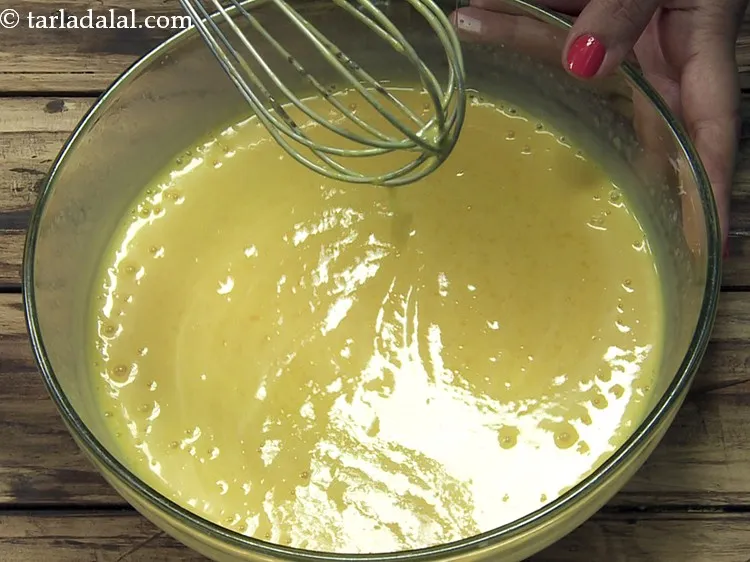 Step 21 – Whisk well till the mixture of&nbsp;<strong>fresh mango ice cream recipe | Indian style mango ice …