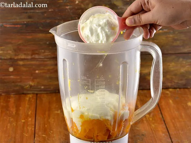 Step 6 – Now, add the curd into the mixer jar. Curd is the key ingredient for any …