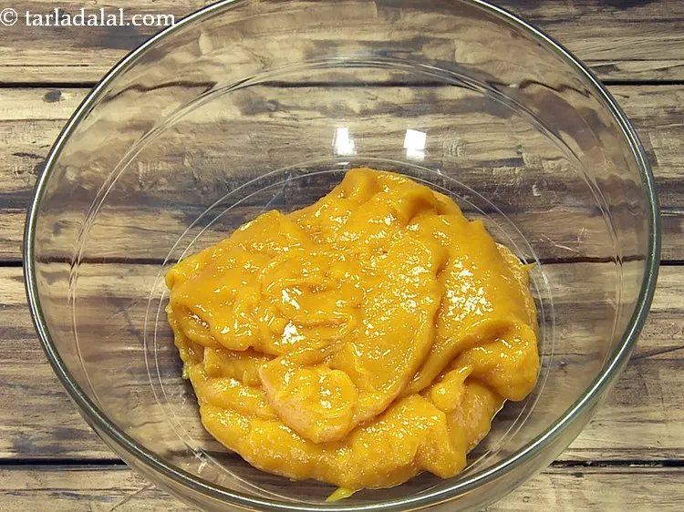 स्टेप 21 – ठंडा होने पर इसमें १/२ कप ताजा <a href=""https://www.tarladalal.com/glossary-mango-pulp-aam-ras-amras-hindi-146i"">आम का …