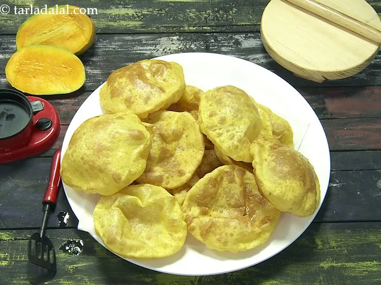 Step 27 – Repeat steps 5 to 7 to deep fry remaining puris.&nbsp;