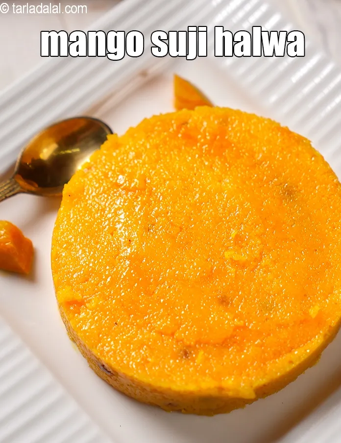 स्टेप 15 – <strong>मैंगो शीरा को</strong>&nbsp;बादाम से सजाकर गरमागरम&nbsp;परोसें ।