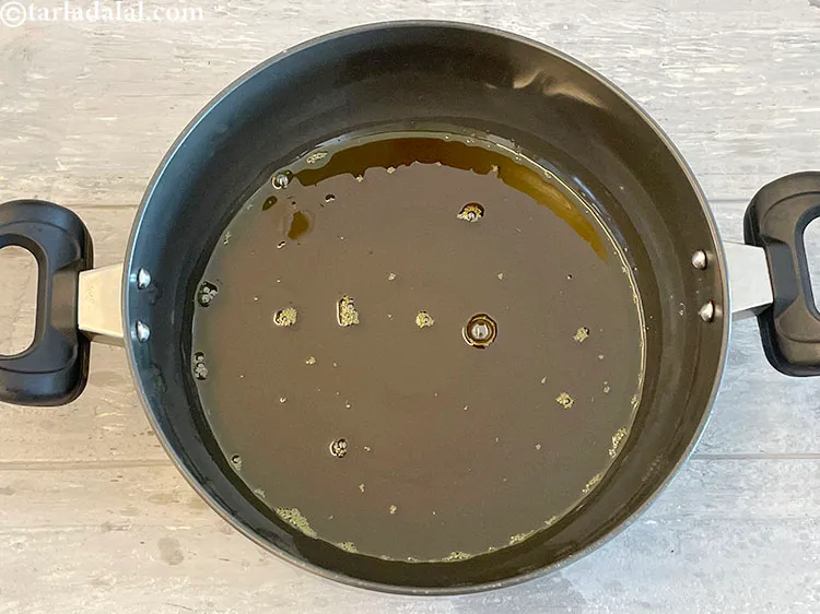 Step 30 – Heat&nbsp;1 1/4 cups&nbsp;<a href="https://www.tarladalal.com/glossary-mustard-oil-rai-ka-tel-sarson-ka-tel-942i">mustard (rai / sarson) oil</a>&nbsp;in a deep non-stick kadhai on a medium …