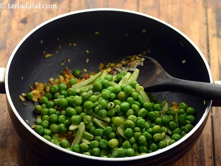 Step 19 – Add green peas.