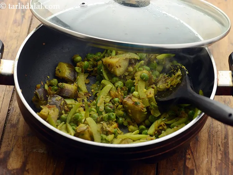 Step 23 – Cover with a lid and cook on a medium flame for 8 to 10 minutes …