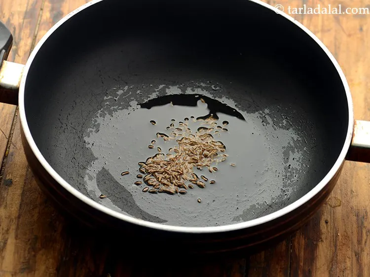Step 10 – Once the oil is hot, add the cumin seeds.