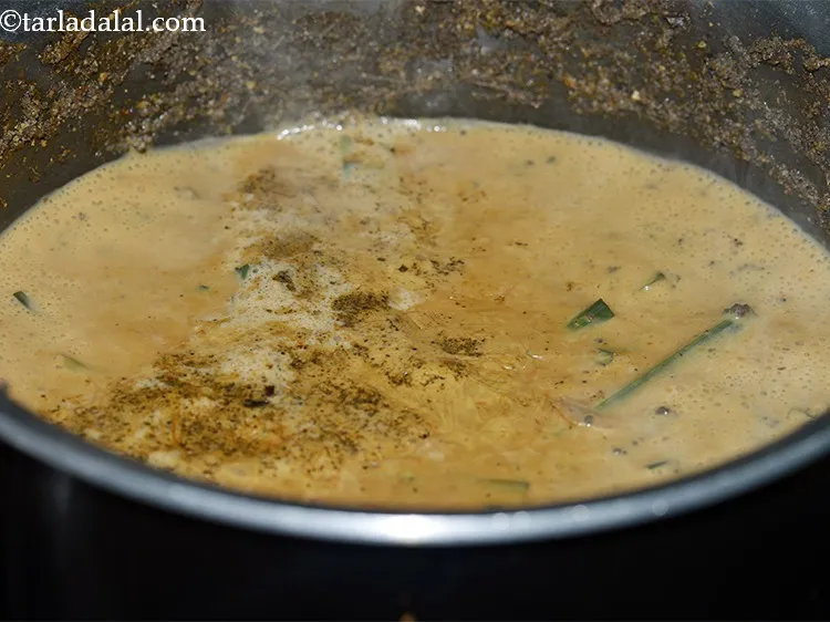 Step 13 – Add the milk, mix well and bring to boil on a medium flame. When the …