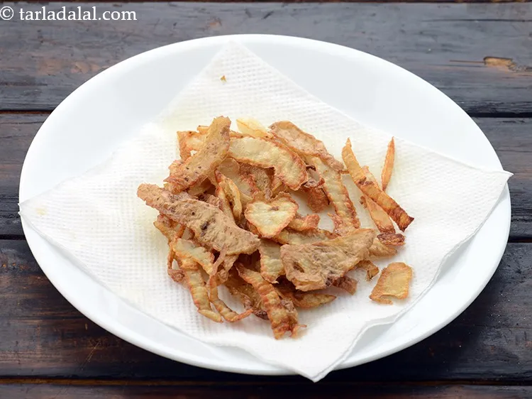 Step 20 – The peels that we did not used can be deep-fried, masalas can be topped mixed …