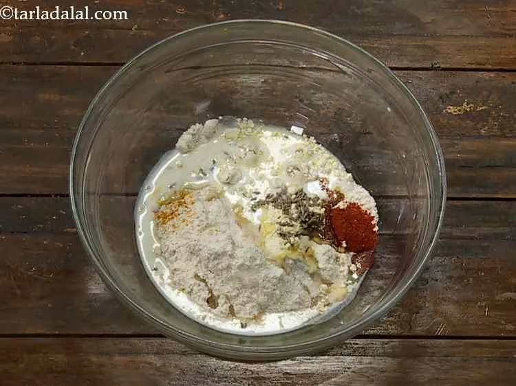 Step 6 – Now add the oil and salt to taste. The oil will make the khakhra nice …