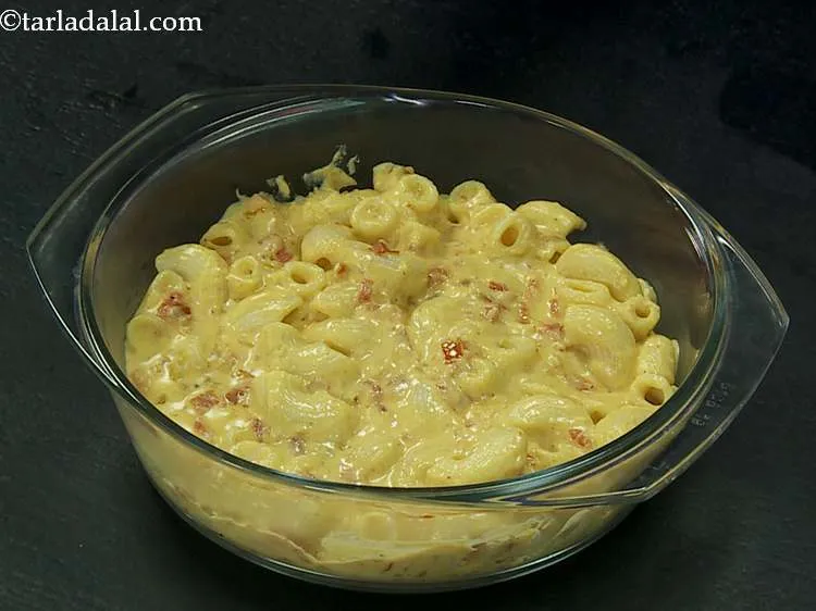 Step 14 – Pour the prepared mac and cheese into a baking dish.