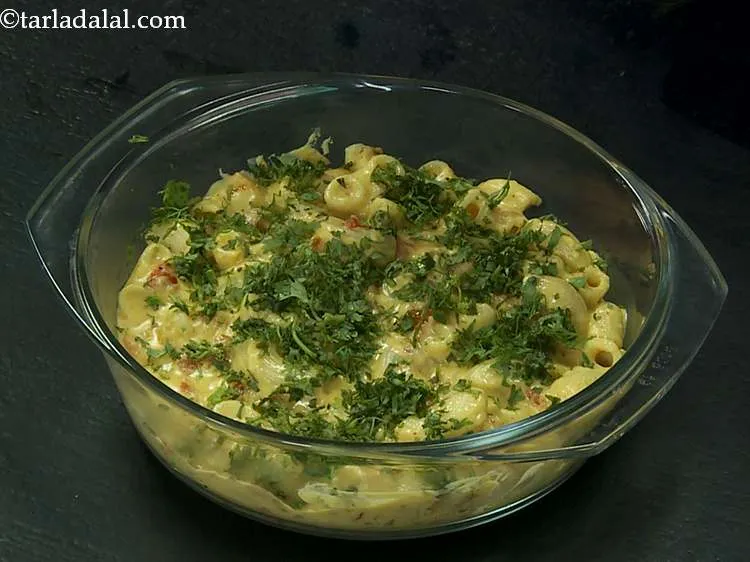 Step 15 – Sprinkle some fresh coriander leaves over the cheese for an Indian touch.