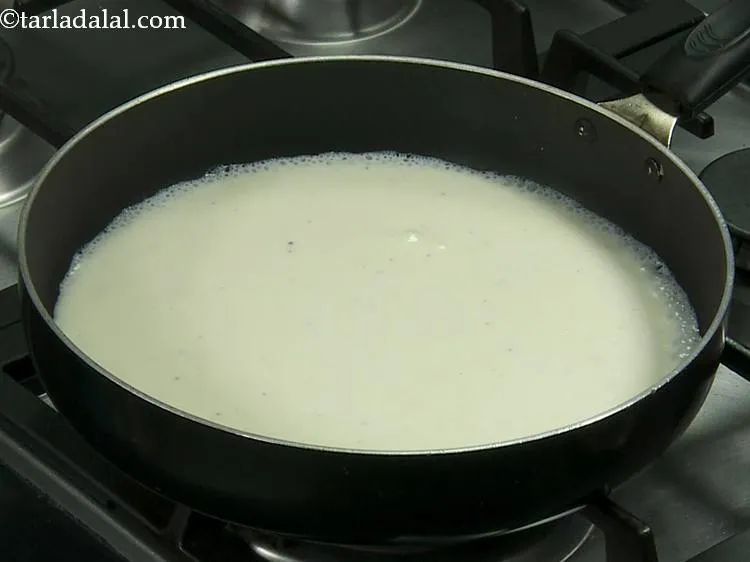 Step 9 – Take another broad non-stick pan and put the <a href="/White-Sauce-(--For-Baking)-113r">white sauce</a> in it. White sauce …