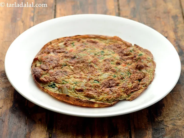 Step 17 – Remove the Indian masala omelette in a plate. You can sprinkle some cheese, black pepper …