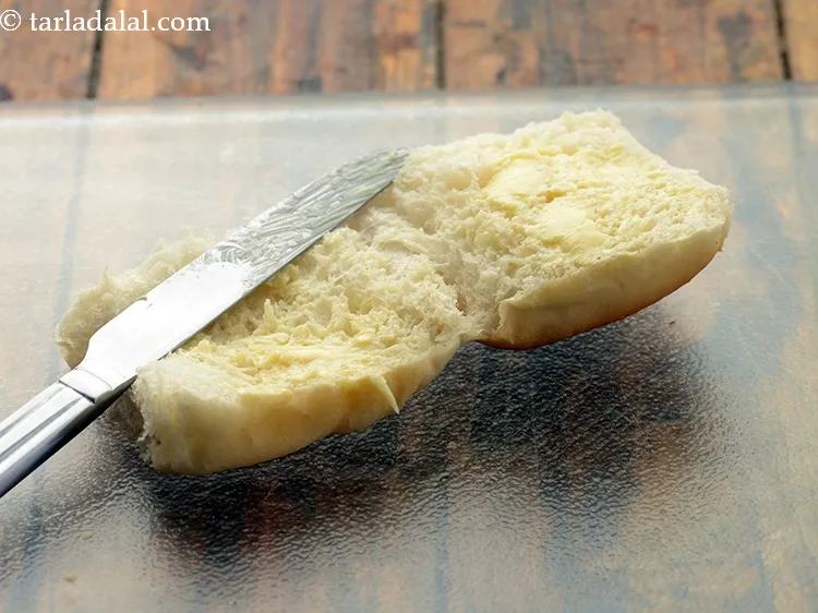 Step 20 – Apply 1 tsp of butter on both sides. Ensure the butter is at room temperature …