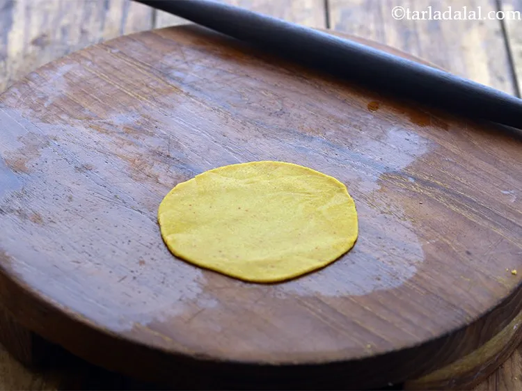 Step 14 – Roll out a portion into a 75 mm. (3&quot;) diameter round. If the dough is …