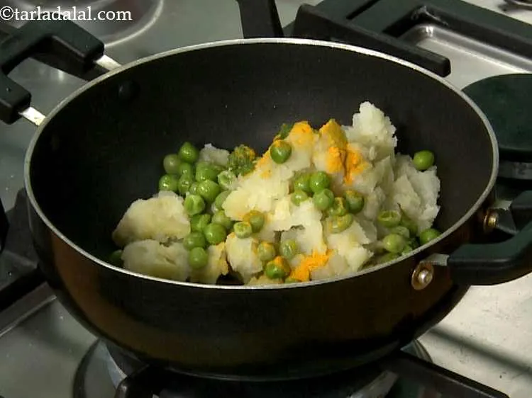 Step 11 – Now add the turmeric powder and green chilli paste. If you love spicy food, feel …