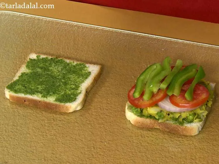 Step 21 – Finally, arrange 6 to 7 capsicum slices over the stuffing. Also, you can put cucumber …