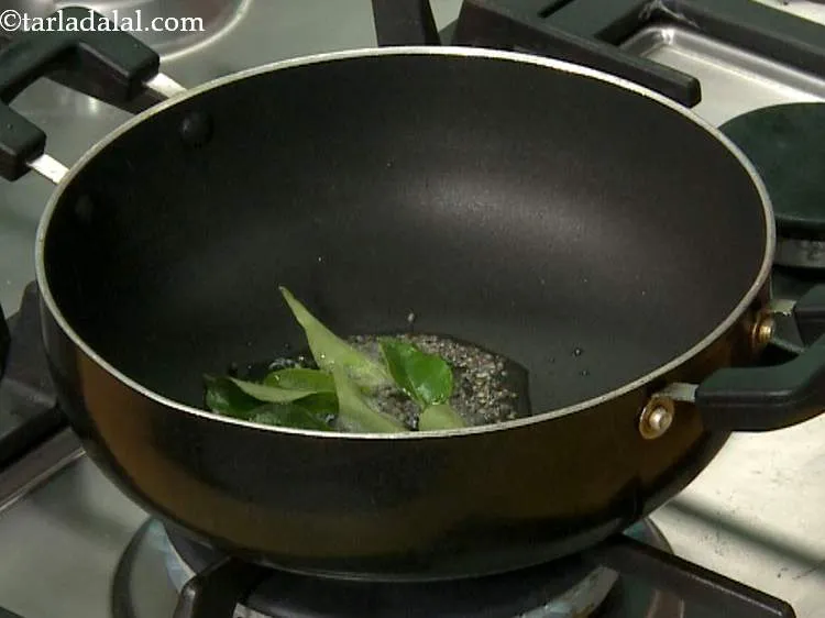 Step 8 – When the seeds crackle, add the curry leaves and saut? on a medium flame for …