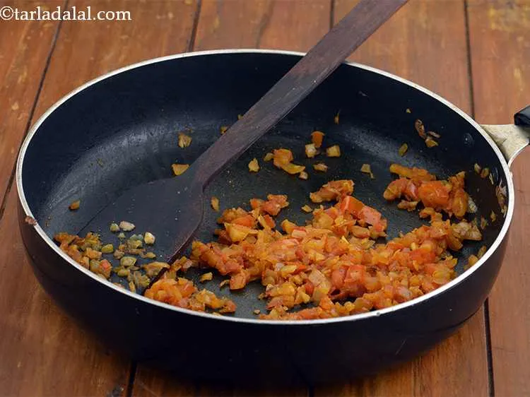 Step 8 – Cook all the masalas and tomatoes on a medium flame for 2 minutes, while stirring …