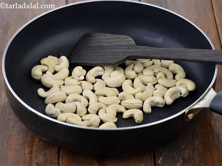 Step 1 – To make <strong>Masala Milk Powder,</strong> first heat a broad non-stick pan, add the cashewnuts (kaju) …