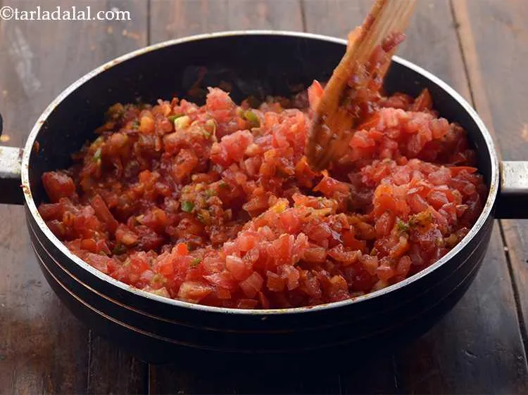 Step 14 – Add the tomatoes and salt.