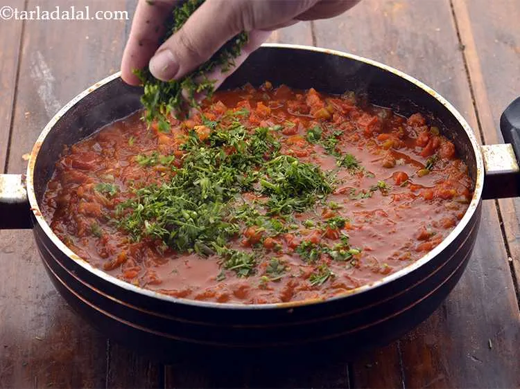 Step 20 – Add the coriander and simmer for another minute.