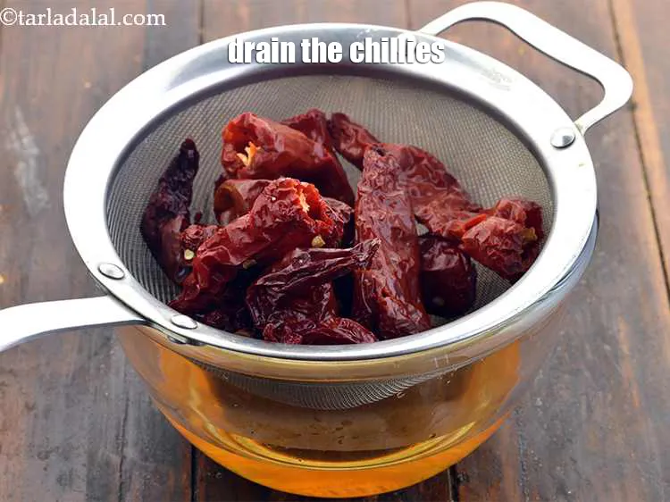 Step 5 – Drain the chillies with the help of a strainer.<br /> &nbsp;