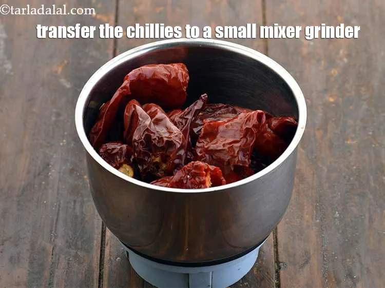 Step 6 – Transfer the chillies to a small mixer grinder. If you are making this&nbsp;<strong>Homemade Chilli Garlic …