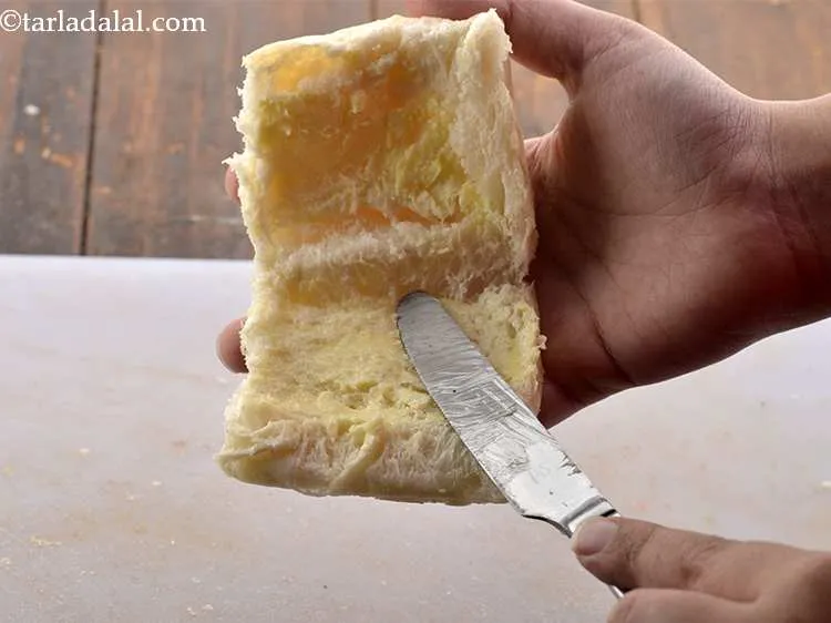 Step 16 – Apply little butter on each side of pav.