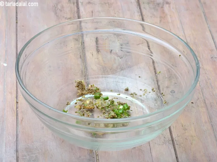 Step 41 – Combine the oil, ginger-garlic paste, green chillies, lemon juice and carom seeds in a microwave-proof …