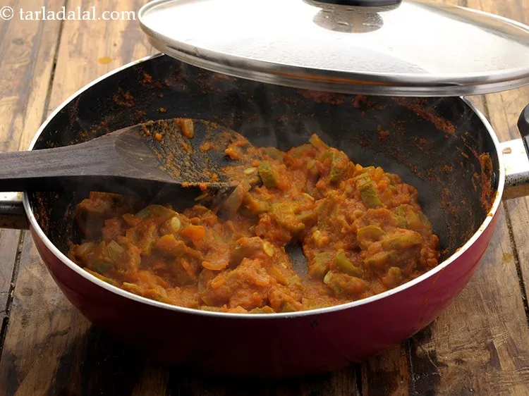 Step 22 – Cover with a lid and cook on a medium flame for 8 minutes or till …