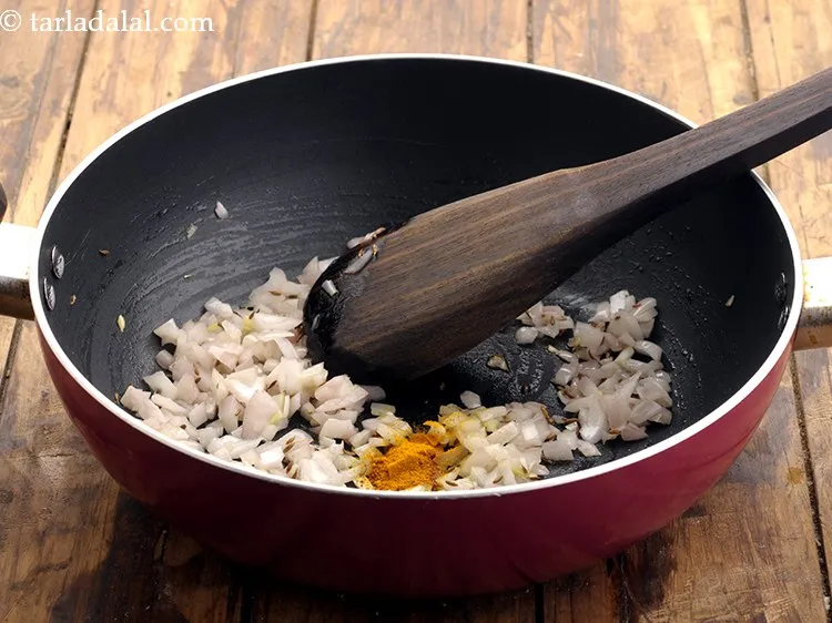 Step 11 – Add turmeric powder.