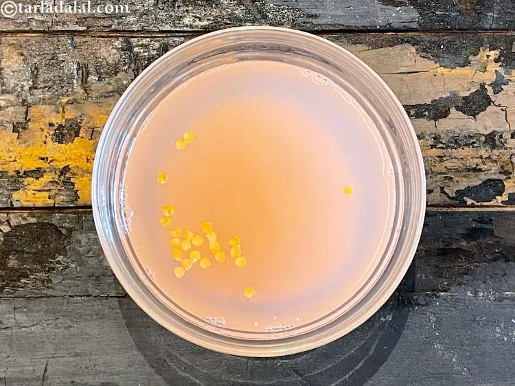 Step 6 – <meta charset="UTF-8" /> Put the masoor dal in a glass bowl and cover with water.&nbsp;Use …