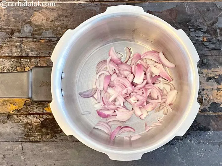 Step 8 – Add&nbsp;<meta charset="UTF-8" />1/2 cup&nbsp;<a href="glossary-sliced-onions-745i">sliced onions</a>.&nbsp;Raw onions are a very valuable source of&nbsp;<a href="https://www.tarladalal.com/recipes-for-Vitamin-C-Rich-Indian-Recipes-804" target="_blank">vitamin …