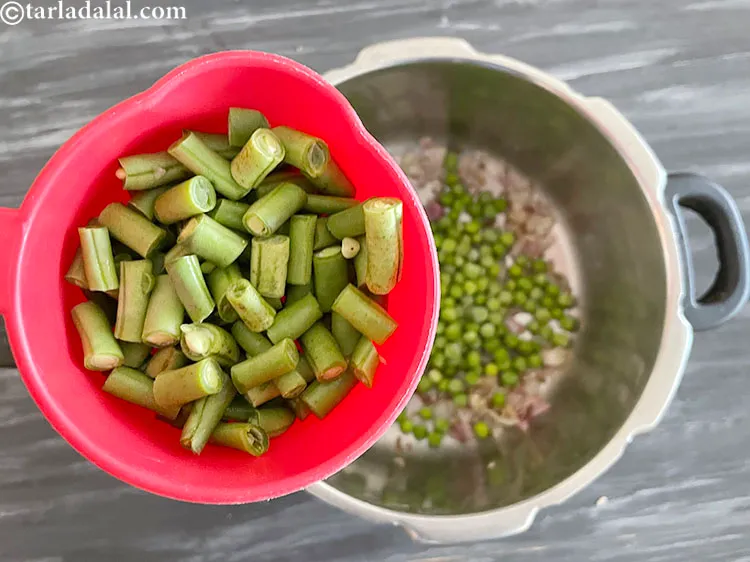 Step 25 – Add&nbsp;<meta charset="UTF-8" />1/2 cup&nbsp;<a href="glossary-chopped-french-beans-797i">chopped french beans</a>.